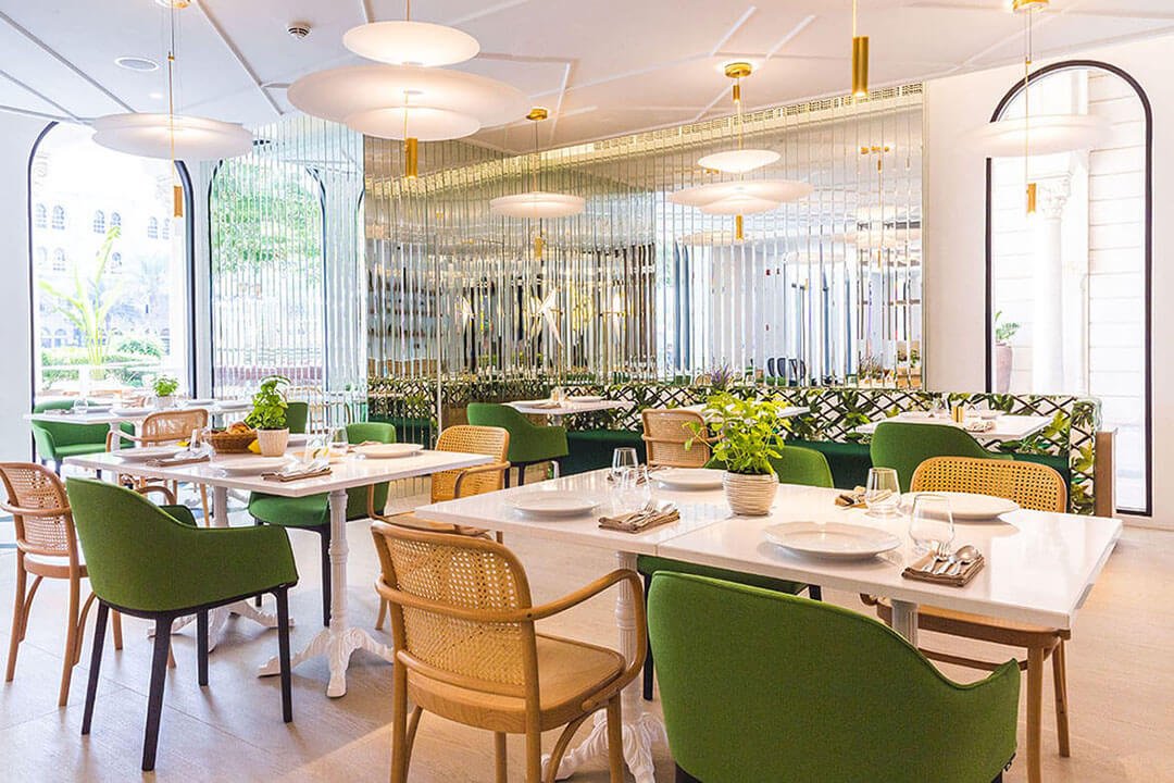 Completed dining area at Shababeek Restaurant showcasing premium restaurant fit-out, contemporary hospitality interiors, and project management by Exceptional PM.