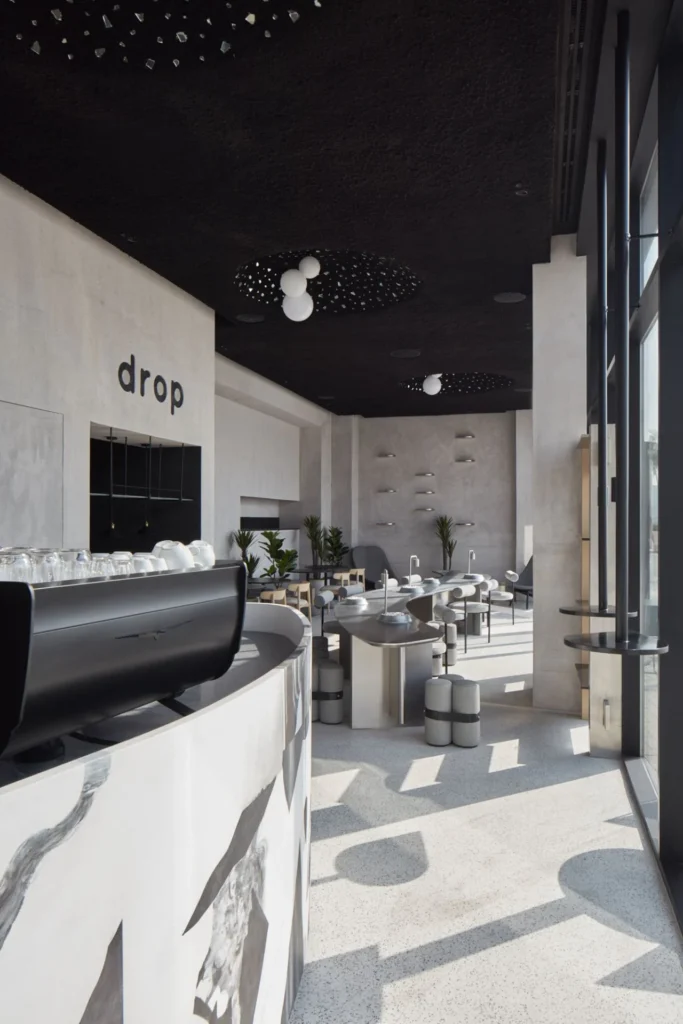 Modern cafe interior design featuring custom furniture, premium finishes, and commercial cafe fit-out by Exceptional PM.