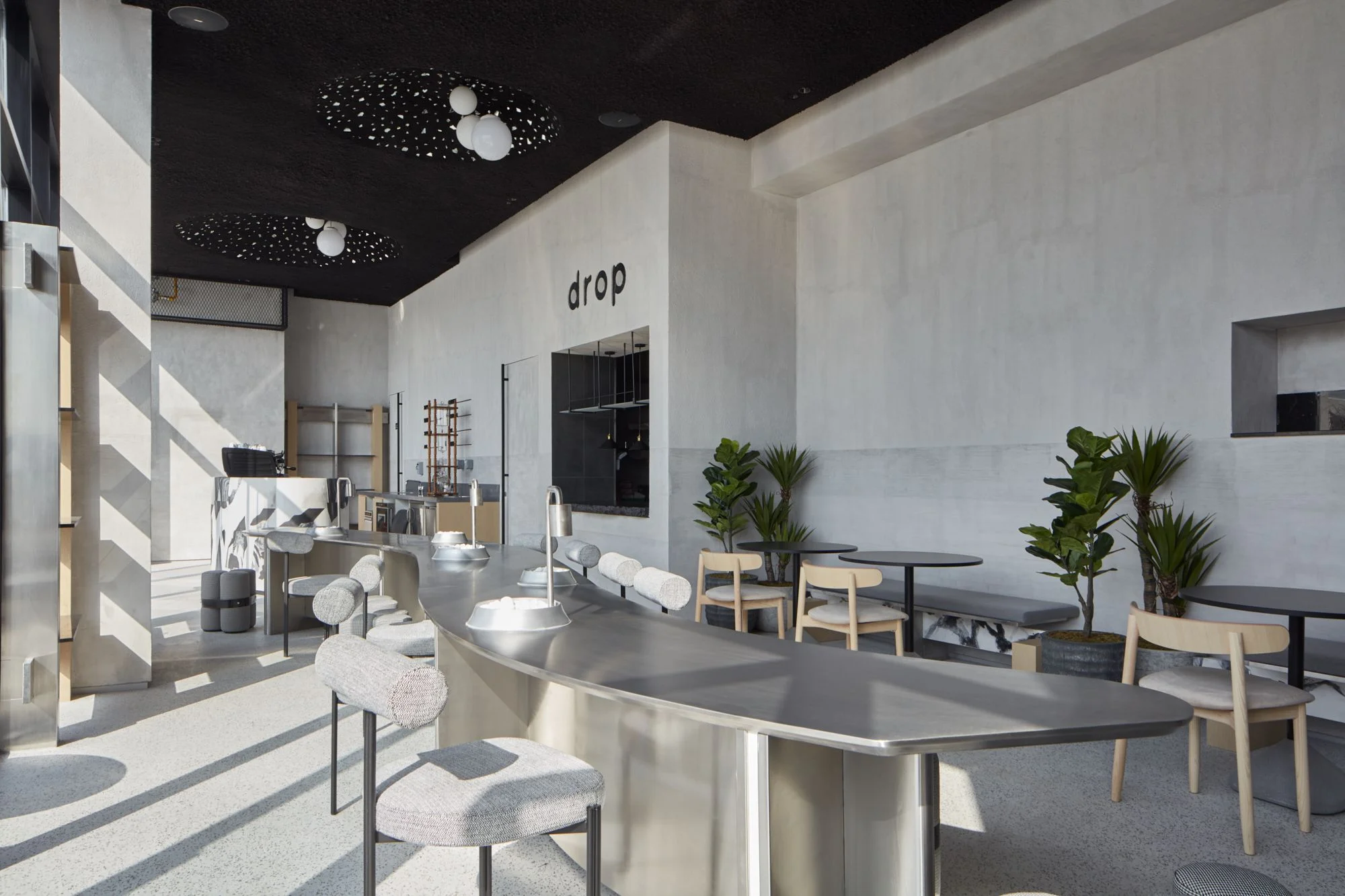 Cafe Fit-Out for Drop Coffee specialty café completed by Exceptional PM, featuring modern café interior design, commercial fit-out, and project management.